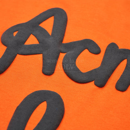 [acmé de la vie] Embossing Script Logo Short Sleeve T-Shirt Orange